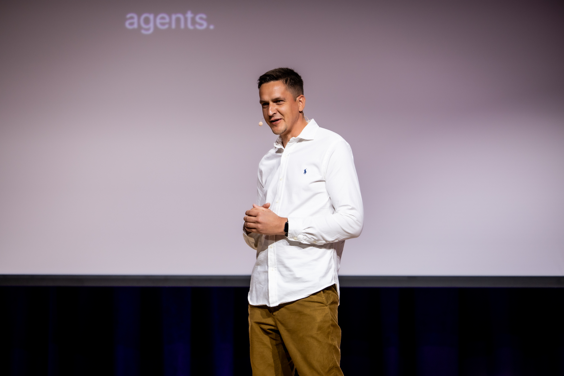 Service Design Day 2026 speaking photo of Indrek Reimand on stage with handheld clicker.